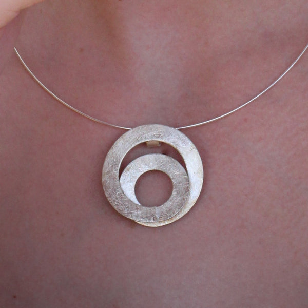 Unique spiral shape silver pendant