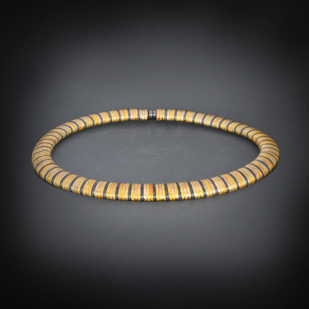 Silver, gold and copper necklace