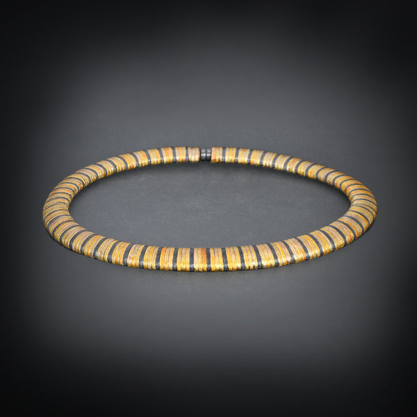 Silver, gold and copper necklace